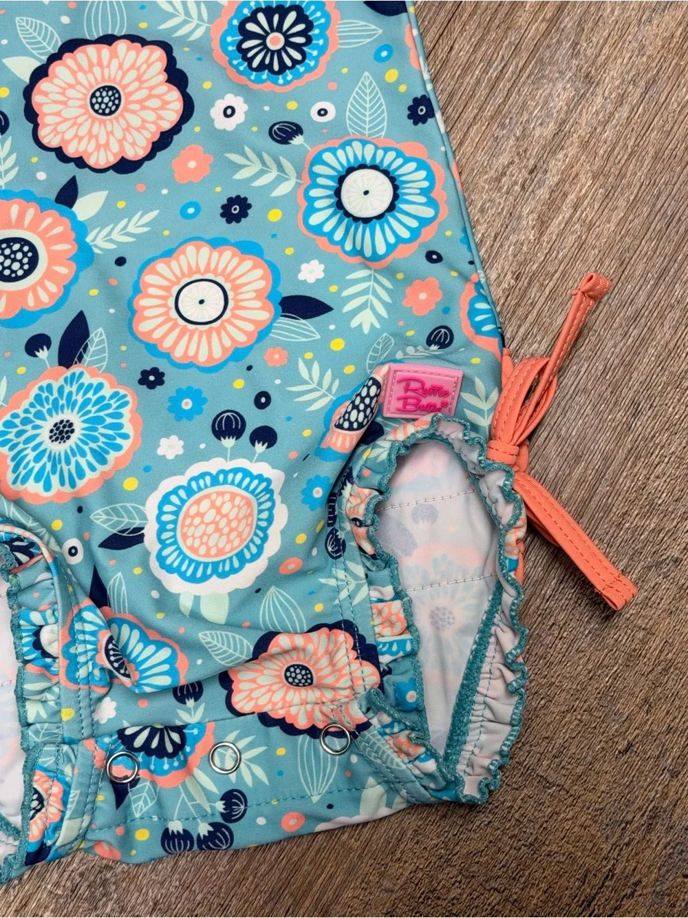 Ruffle Butts long Sleeve Floral One-Piece Swimsuit- size 3-6 months